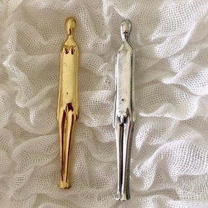 Rare pair of nude brooches in gold & silver tones